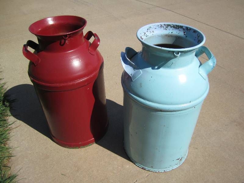 Blue and red milk cans...