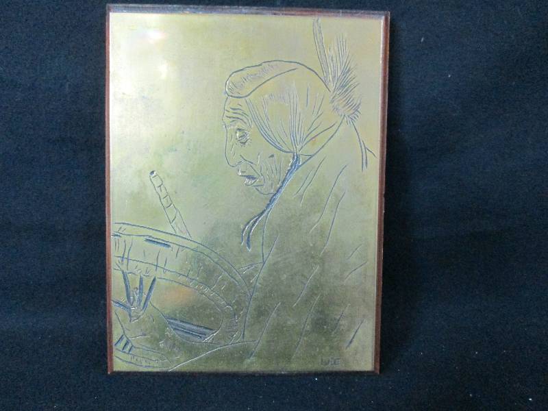 lot 128 image: Brass Plate Carving of a Indian Facing Left