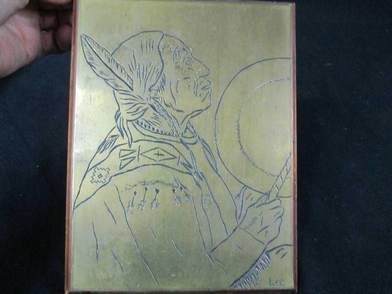 lot 129 image: Brass Plate Carving of a Indian Facing Right