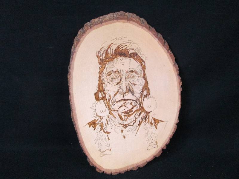 lot 177 image: Wood Burning of a Indian