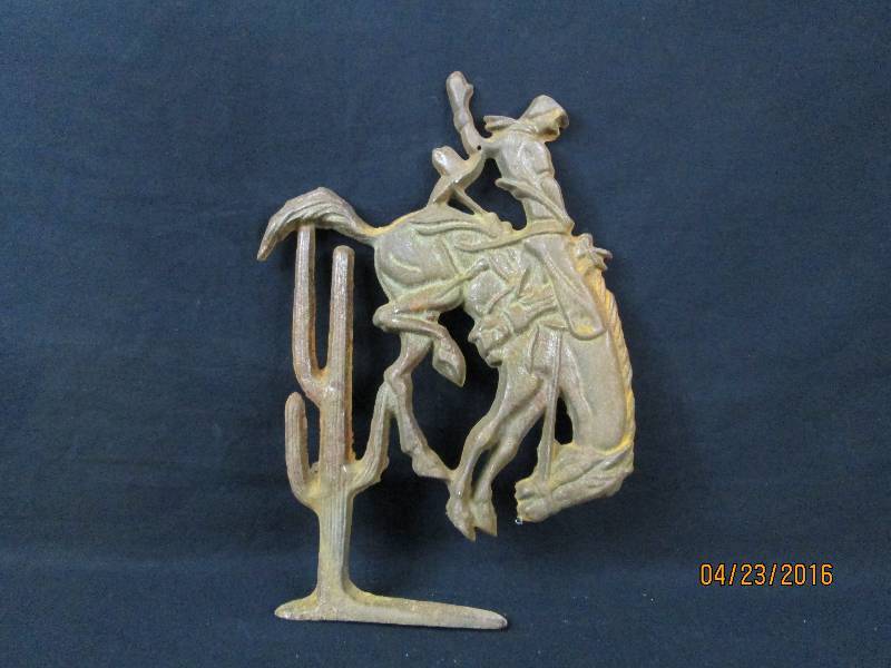 lot 28 image: Cast iron Bucking Bronco