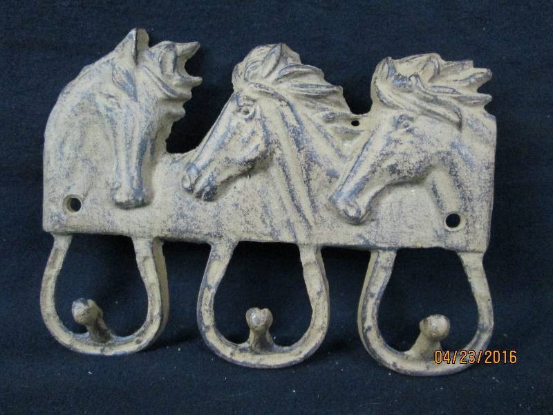 lot 30 image: Cast Iron 3 Horse Wall Hook.