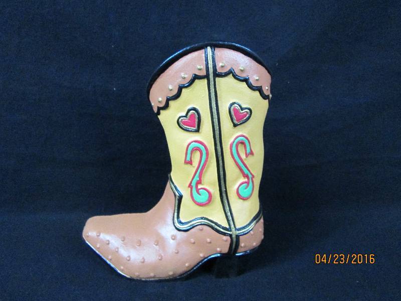 lot 51 image: Department 56 Cast Iron Cowboy Boot