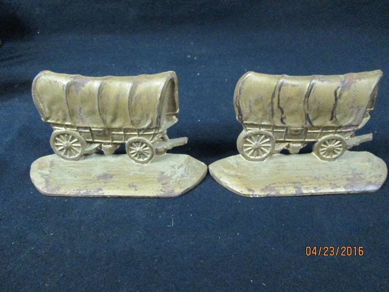 lot 62 image: W.H Howell Co Covered Wagon Bookends