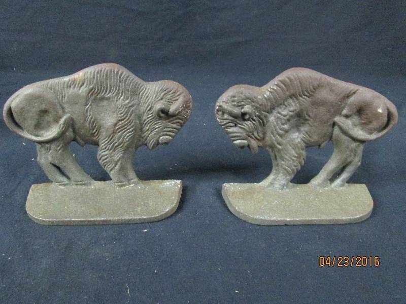 lot 66 image: Cast Buffalo Bookends
