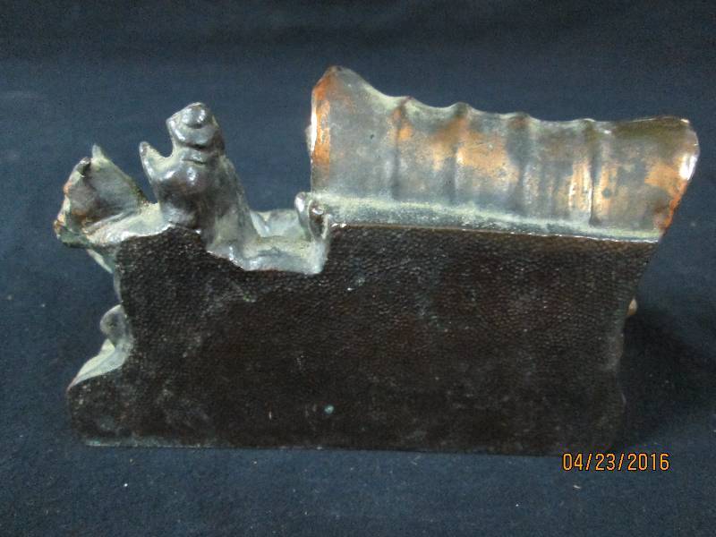 lot 85 image: Cast Covered Wagon Bookend