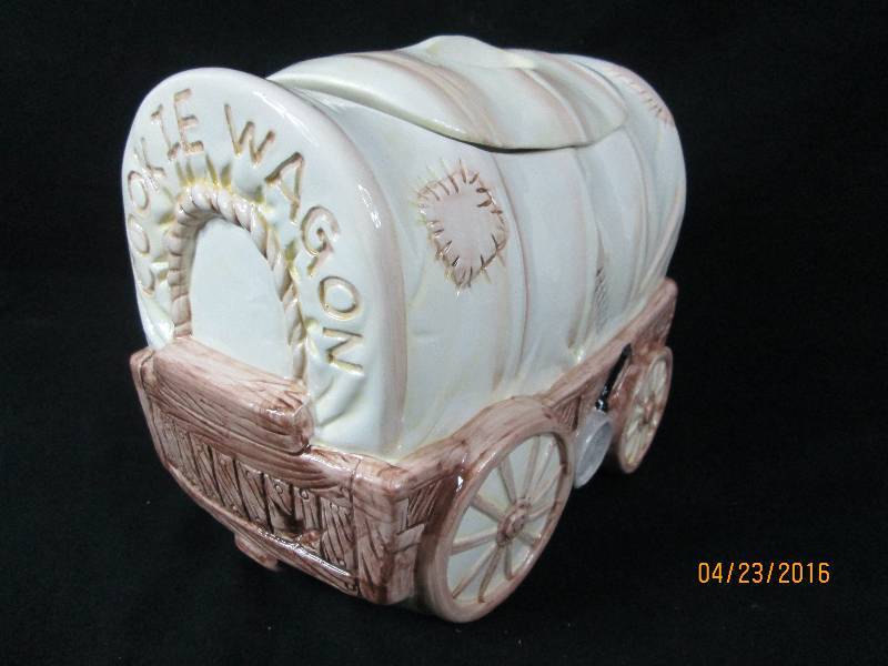 lot 94 image: Earthenware Covered Wagon Cookie Jar