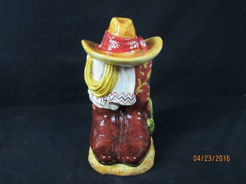 lot 96 image: Cowboy Hat & Boot Cookie Jar
