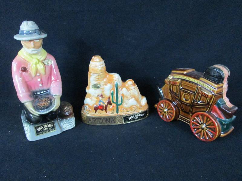 lot 261 image: Gold Miner & Stage Coach Decanters