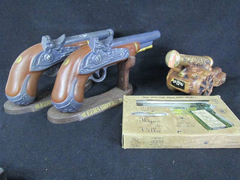lot 265 image: Gun & Cannon Decanters