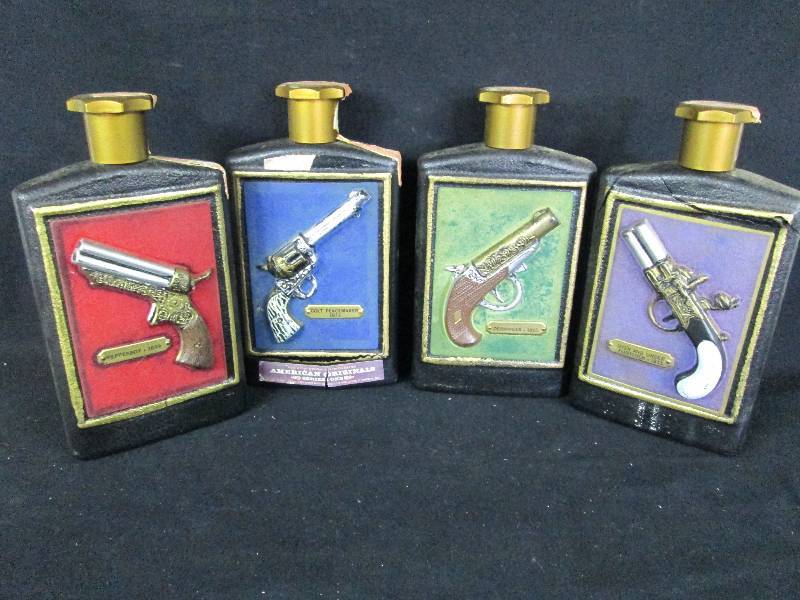 lot 266 image: Gun Decanters