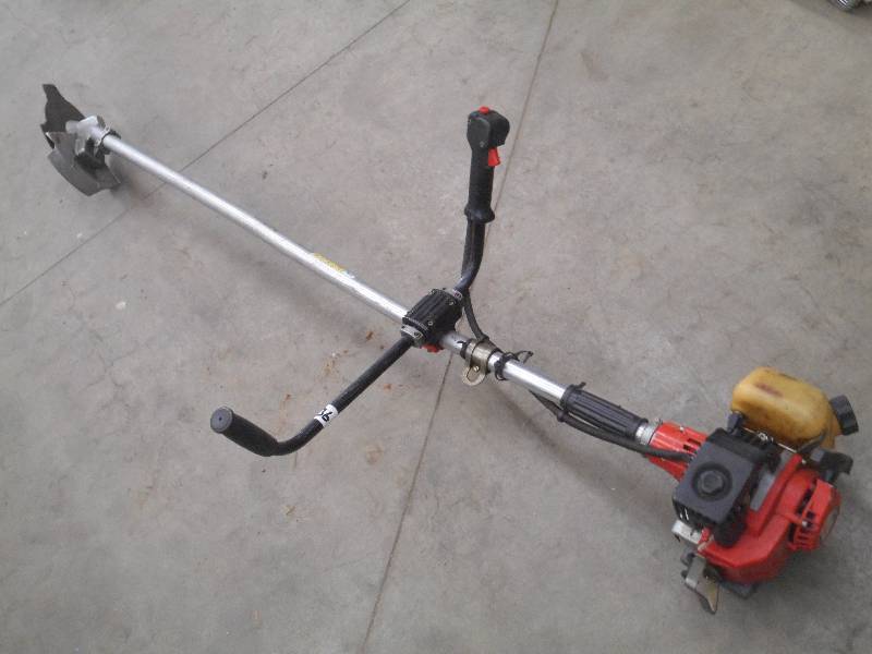 lot 36 image: Gas-Powered Brush Cutter ...