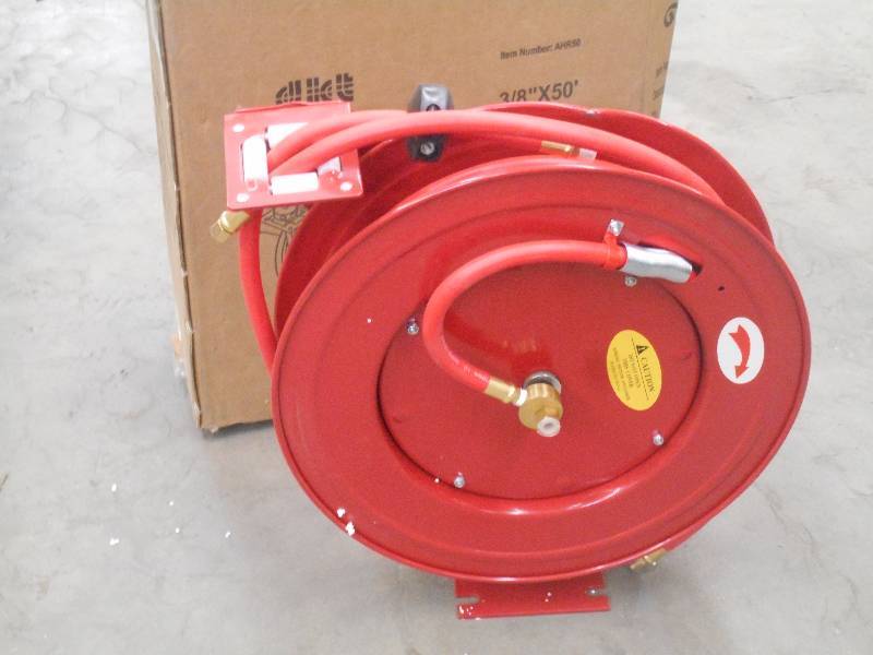 lot 38 image: New Unused Auto-Retract Hose Reel W...