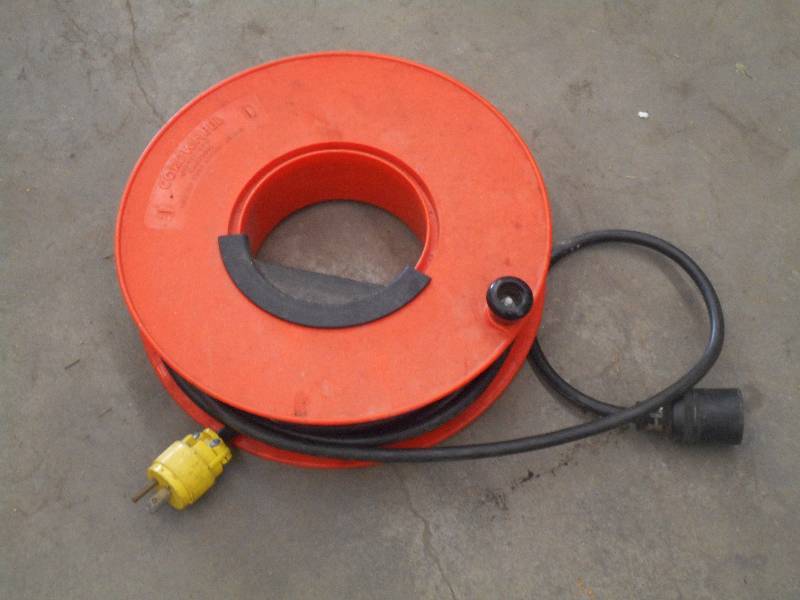 lot 47 image: Cord Wheel With 100ft Electric Cord...