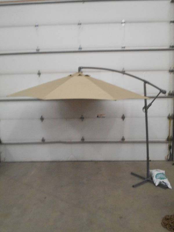 lot 53 image: Like New 9 Market Umbrella, Hand-C...