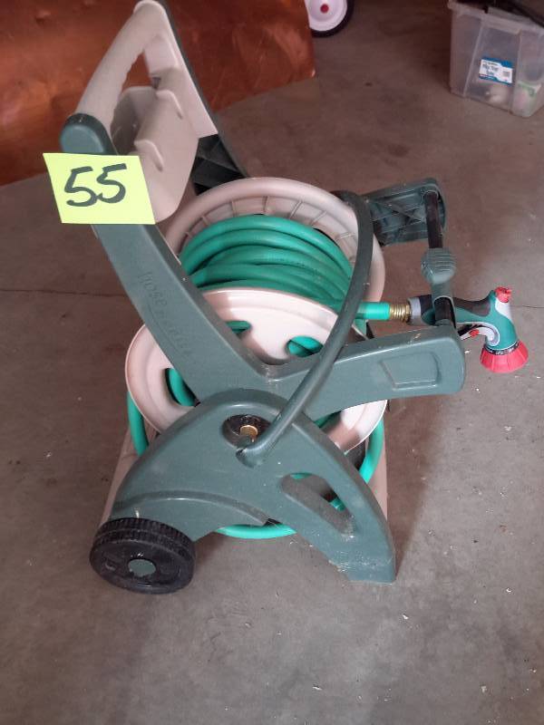 lot 55 image: Hose Caddy and Hose with sprayer attachment