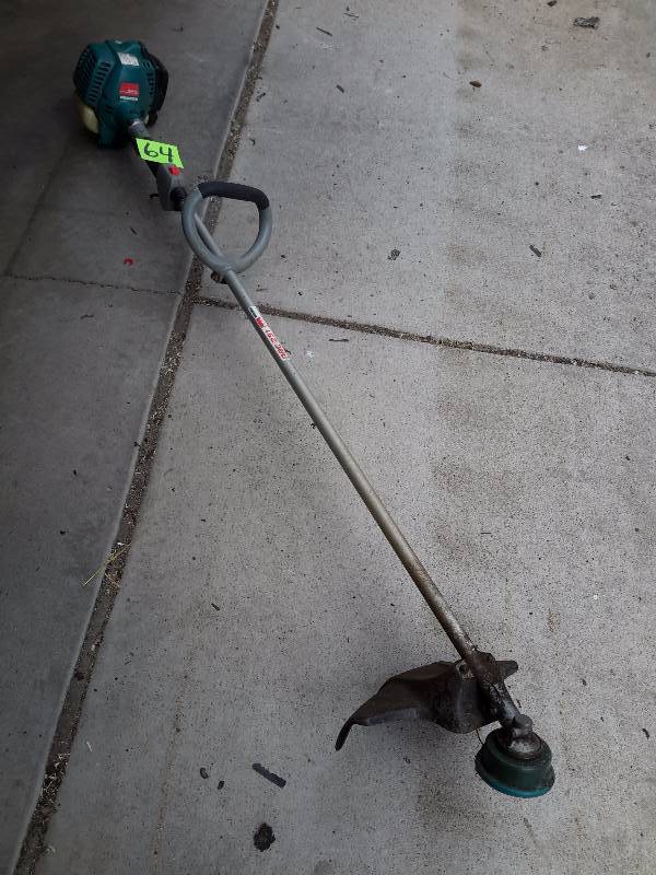 lot 64 image: MAKITA, RBC 251 Weed whip.. Untested, but turns over.. No gas in it.