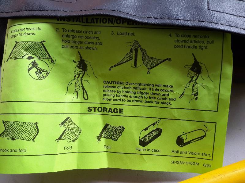 lot 69 image: 2 pair of knee pads, Stanley Crow Bar, Cargo net cover.