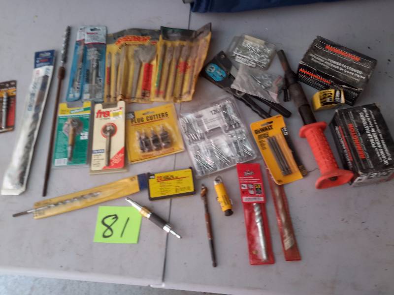 lot 81 image: Drill and router bits.. Pop Rivet Gun and pop rivets  Remington Power actuated tool and ammo, Fat max Extreme.. Quick Spike.