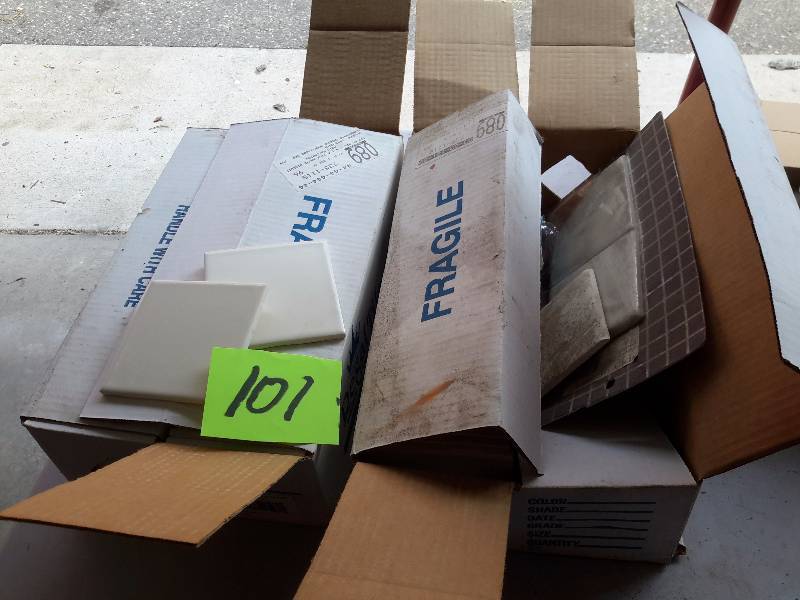 lot 101 image: 1 12  boxes of(144) of 4 14 in x 4 14in tile. REGAL TILE.  MATTE BISCUIT.  JADO, wall containers.  Look like they might be soap dispensers, but no pump..  Chrome and Glass..3 Holders,  2 glass bottles.