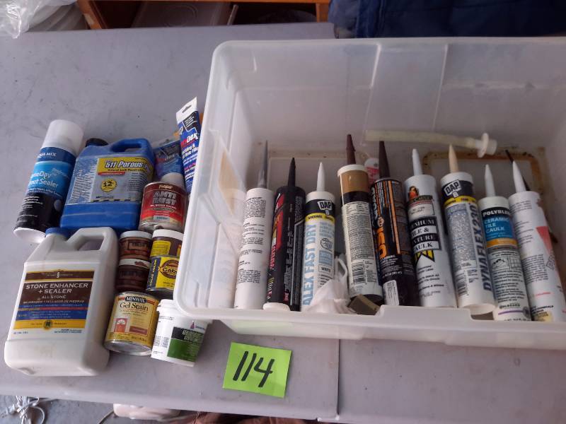 lot 114 image: Misc. Caulk, wood paste and liquid products as pictured