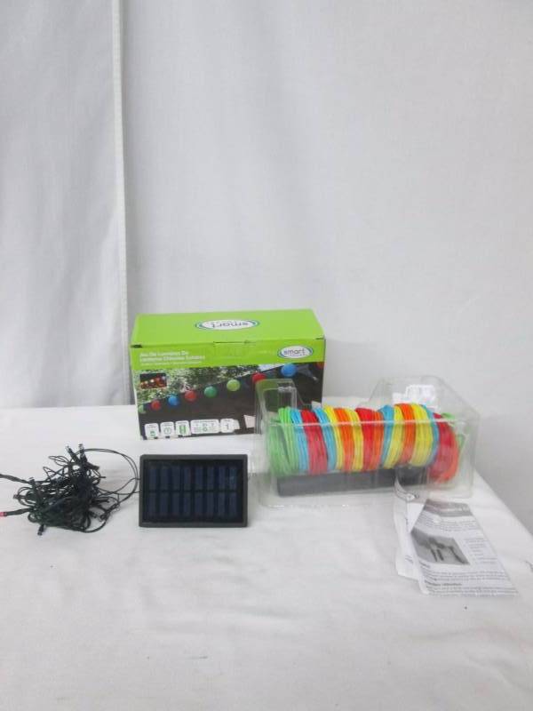 lot 66 image: LED Solar Lantern Lights - String of 20