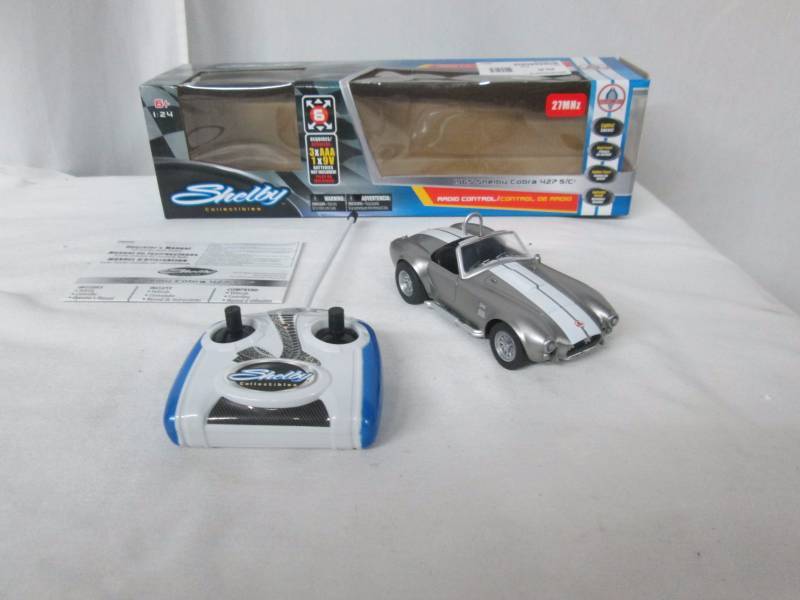 lot 67 image: 1965 Shelby Cobra 124 Scale Remote-Controlled Car - Silver