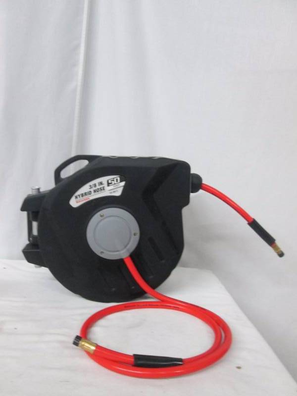 lot 14 image: Master Craft 50 Retractable Hybrid Compressor Hose and Reel