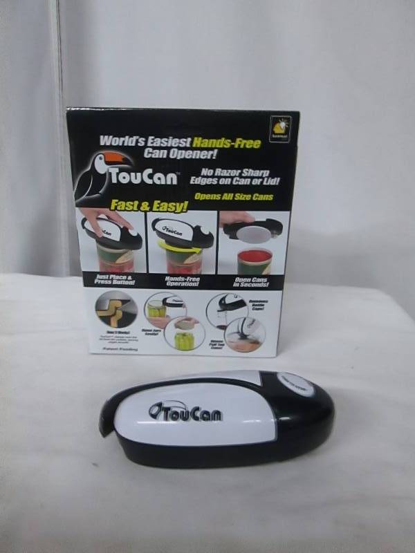 lot 58 image: As Seen on TV TouCan Hands-Free Can Opener