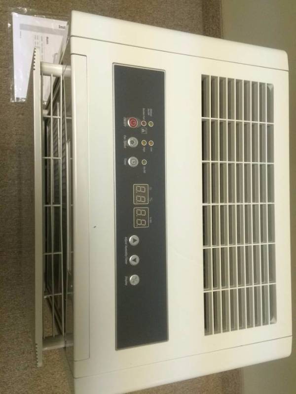 lot 14 image: New Friedrich 50-Pint Dehumidifier with Drain Pump