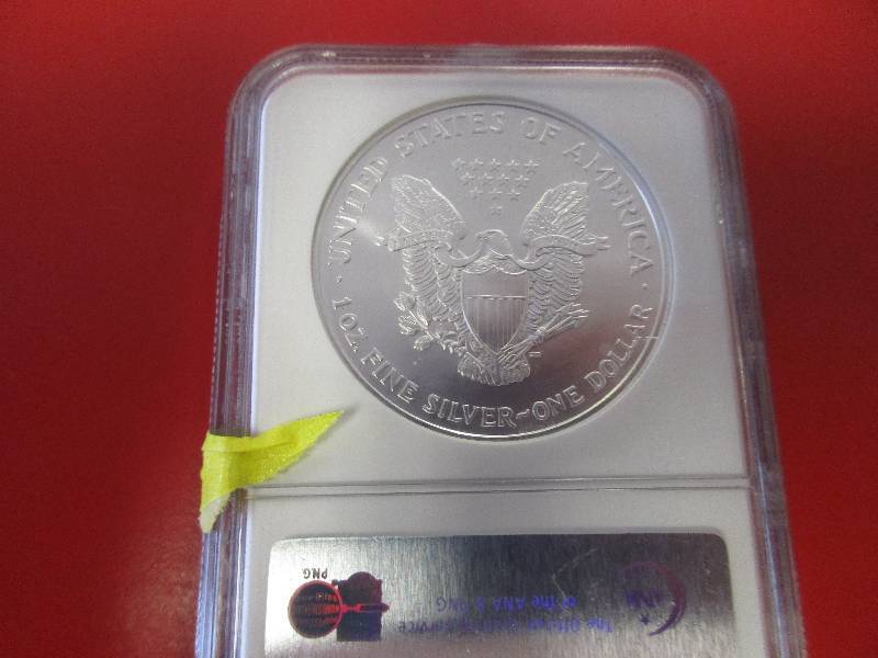  NGC First Strikes Certified 2006 American Silver Eagle in GEM Uncirculated Condition.