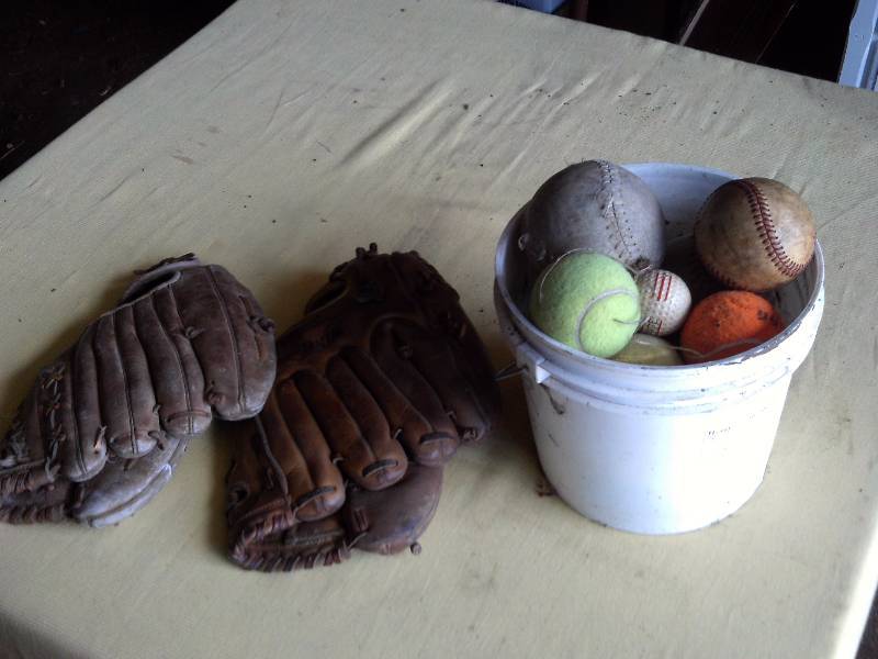 BASE BALLS AND TENNIS BALLS AND MITTS