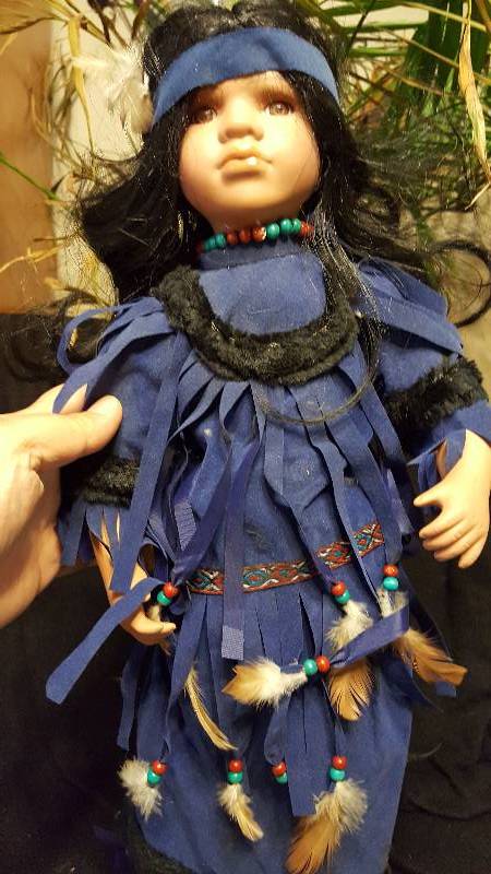 Native american porcelain doll