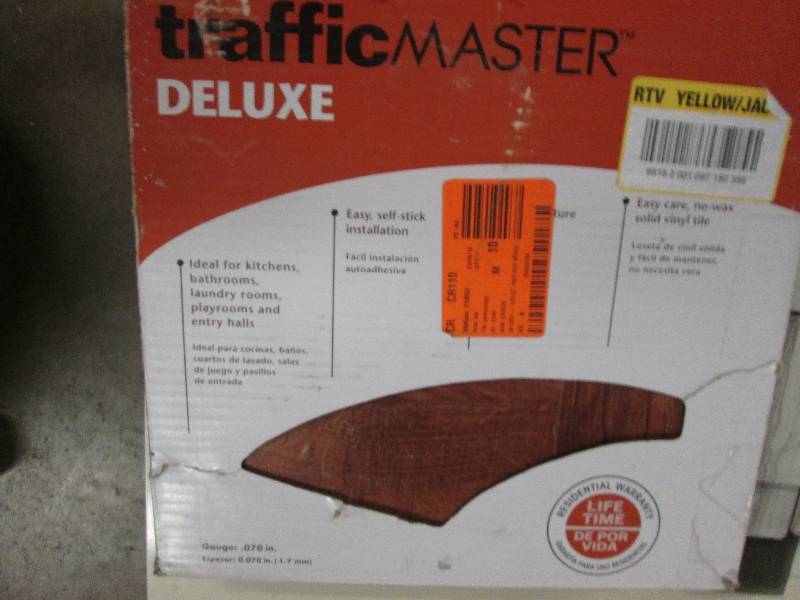 lot 41 image: Traffic Master Deluxe 12 in. x 12 i...