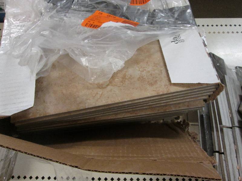 lot 48 image: Daltile Catalina Canyon Noce 12 in....