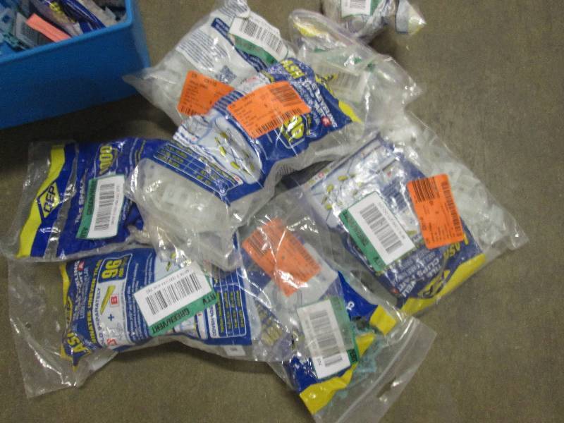 lot 67 image: Large lot of assorted tile clips...