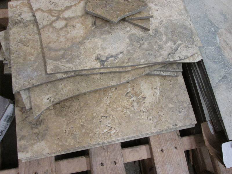lot 145 image: 18x18 inch tile- damaged...