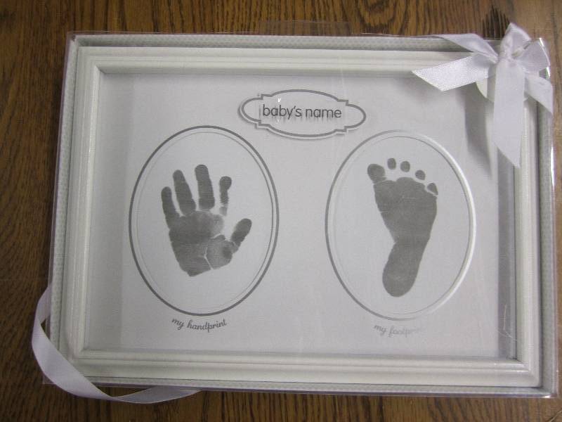 lot 56 image: New baby hand and footprint display...