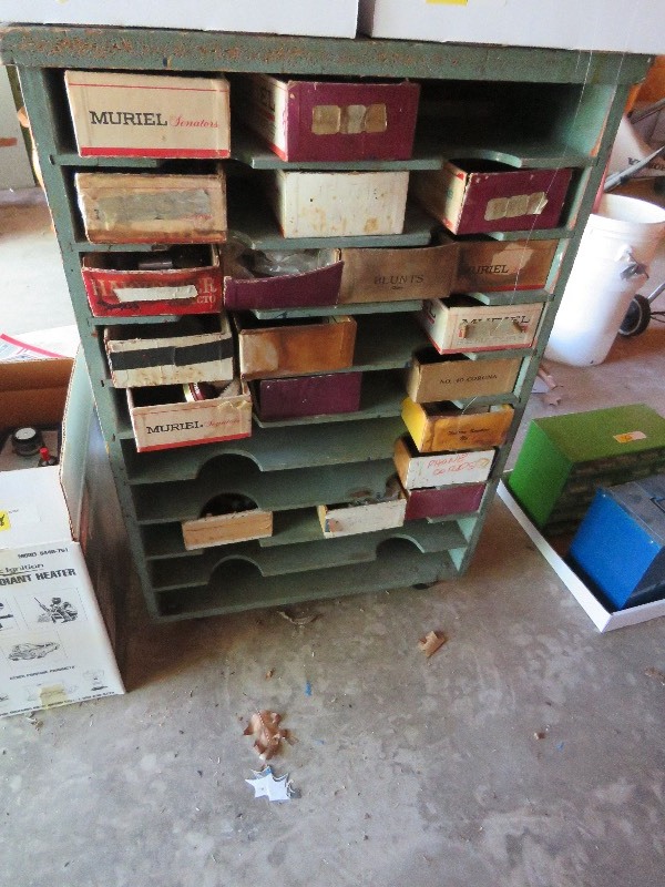 Wood shelf with cigar boxes