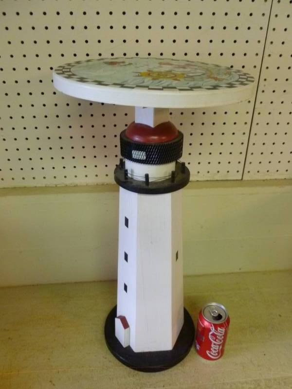 lot 60 image: Lighthouse Cocktail Table