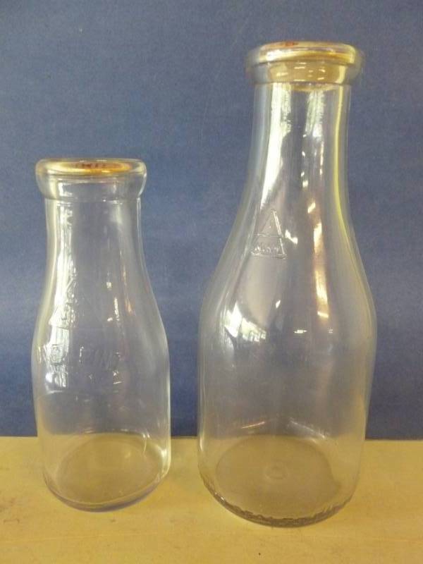 lot 93 image: Vintage Milk Bottles