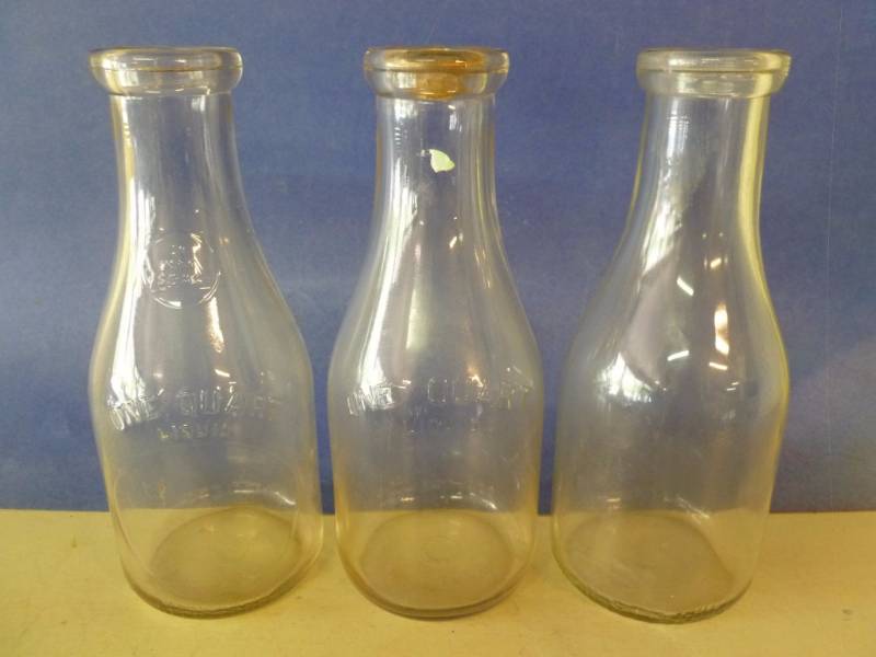 lot 94 image: Vintage Milk Bottles
