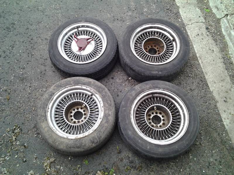 4-14 Inch Wire Spoke Wheels (One Center Cap) With Mismatched Tires
