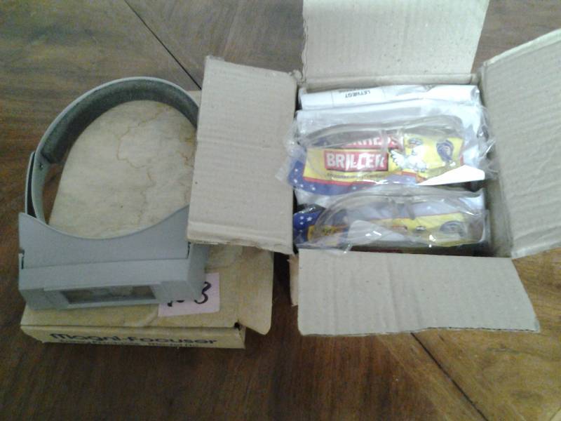 Magnifier and Case of 12 Safety Glasses