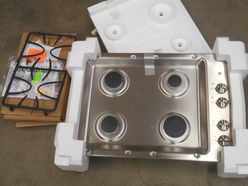 lot 33 image: New Unused GE 4-Burner Stainless St...