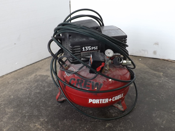lot 15 image: 6 Gallon Porter Cable 135HP Air Compressor