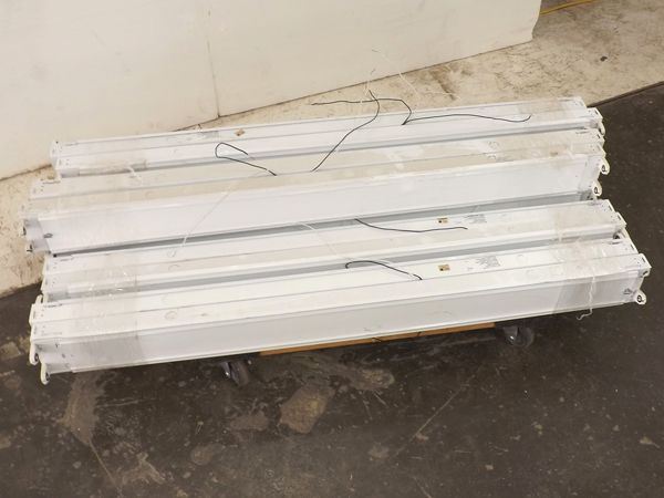 lot 89 image: Lot of 12 BRAND NEW Fluorescent 4 Light Fixtures