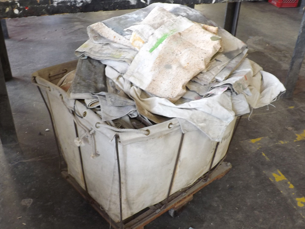 lot 68 image: Large Rolling Bin Full of Burlap Tarps