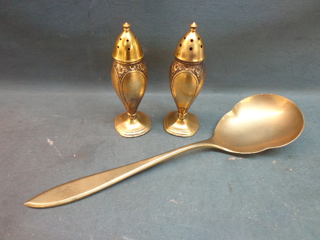 lot 91 image: Clover Shakers & Spoon