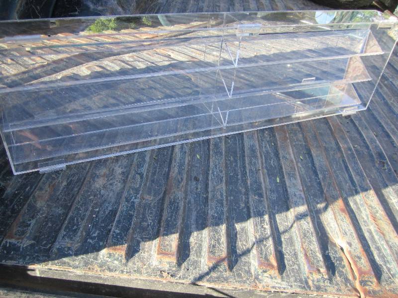 lot 95 image: Mirrored NASCAR replica or other collector items.  Measures 40.5 x 11.5 x 4 Mirrored back highlights all angles of your display.  Nice clean acrylic construction in good shape